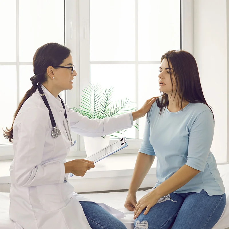 Vesta Care doctor advising a patient at home in Dubai