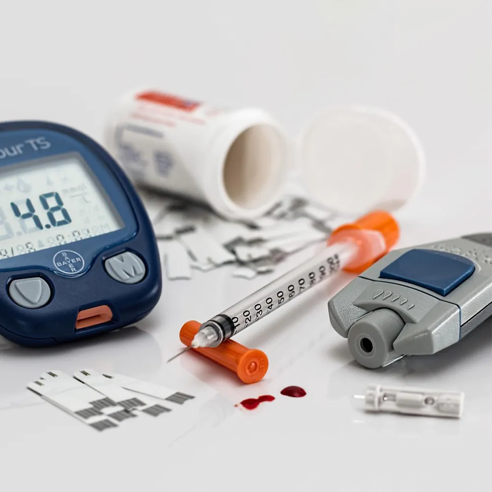 Blood glucose meter with insulin and diabetes testing supplies