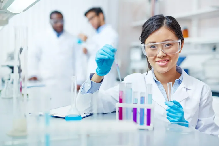 A laboratory scientist analysing an STD sample at an accredited reference laboratory in Dubai