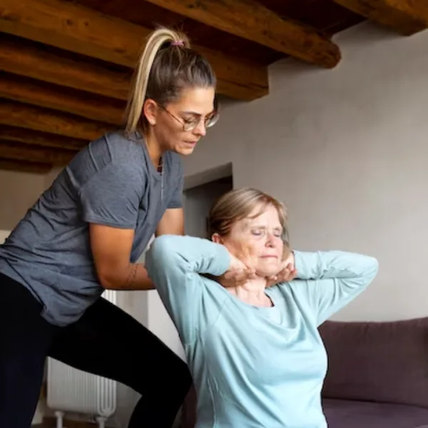 Senior doing balance and falls-prevention physiotherapy at home in Dubai