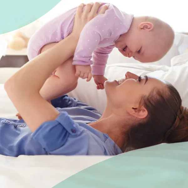 DHA-licensed Vesta Care postnatal nurse supporting a mother and newborn baby at home in Dubai