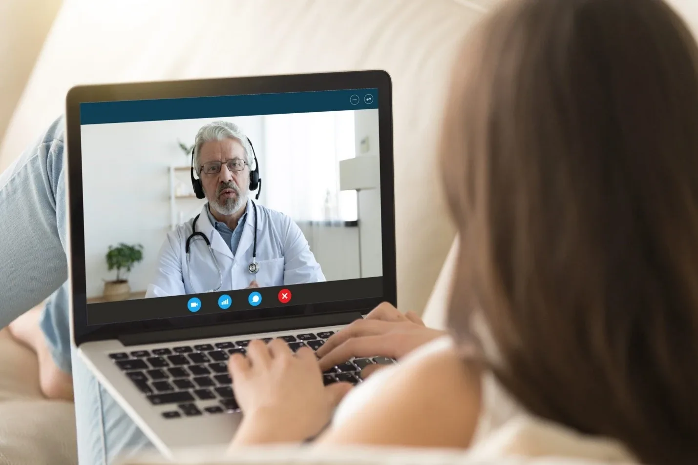 Doctor consulting a patient by video call