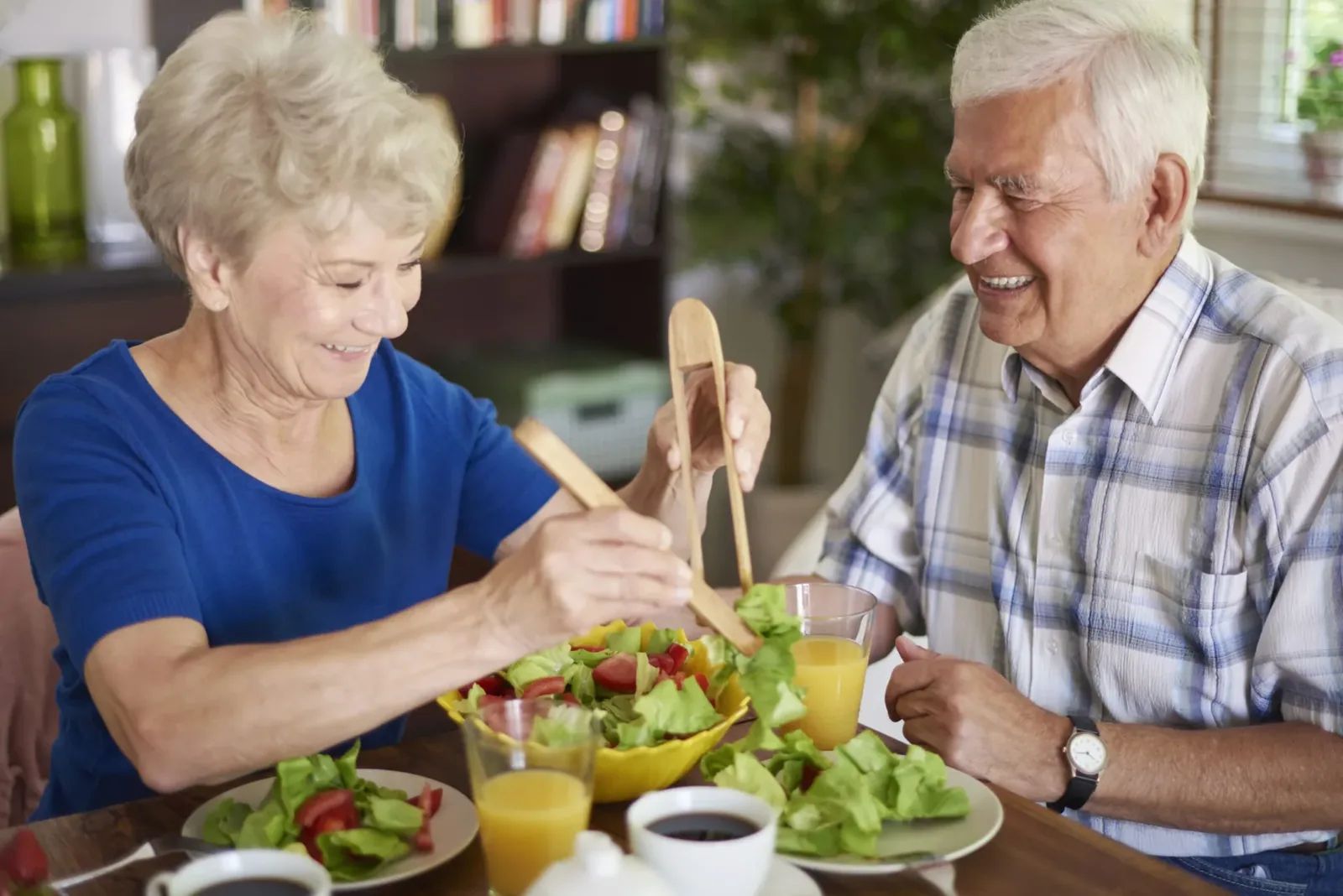 Senior couple sharing breakfast in an assisted living residence in Dubai
