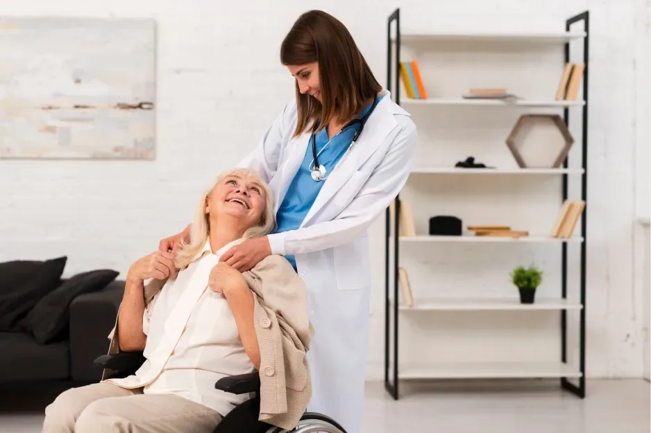 Physiotherapist treating an older woman's neck and shoulders at home